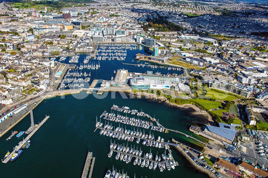 Aerial image of a stunning close view of Plymouth Boatyard & Marina, Sutton Marina, The Barbican, and National Marine Aquarium.
