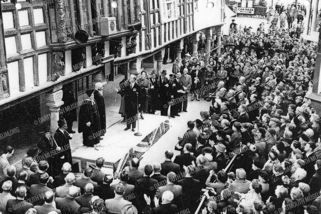 Historical photograph of the re-opening of the Butterwalk in Dartmouth on 14th April 1954, after the restoration following bomb damage during the war.