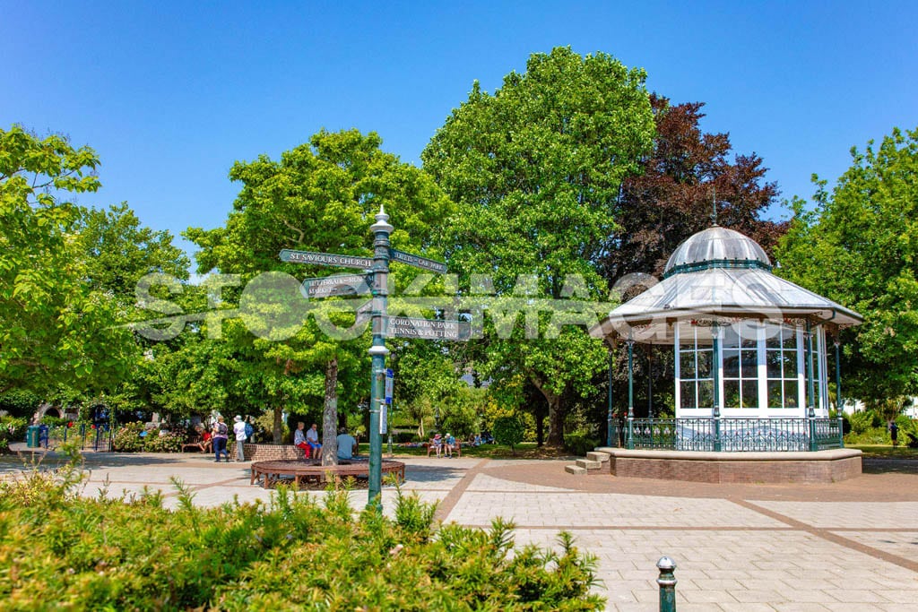 Image of the Bandstand in Dartmouth's Royal Avenue Gardens with visitors enjoying the sunshine and surroundings.Image of the Bandstand in Dartmouth's Royal Avenue Gardens with visitors enjoying the sunshine and surroundings.